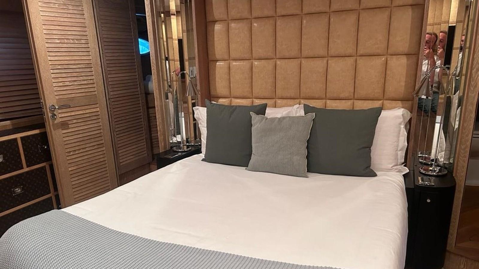 a bed with pillows aboard MIDNIGHT MADNESS Yacht for Sale