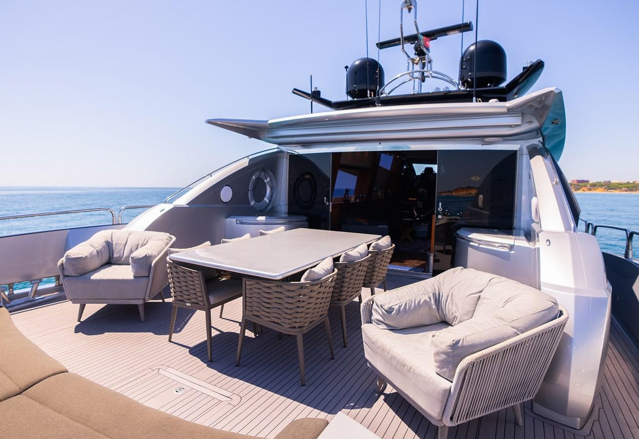 a boat on a deck aboard GEE WHIZZ Yacht for Sale