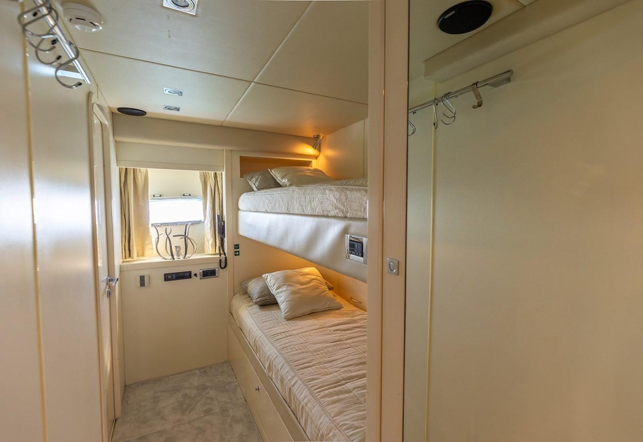 a room with two beds aboard GEE WHIZZ Yacht for Sale