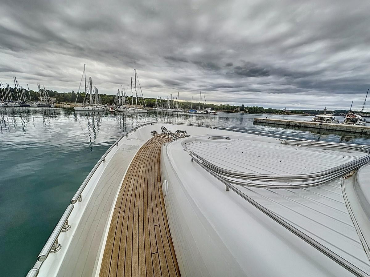 a long wooden walkway over water aboard NAUTILUS Yacht for Sale