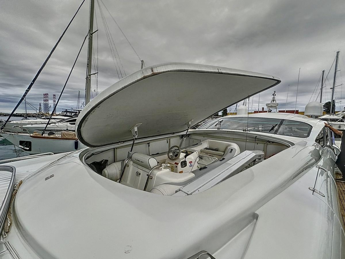 a white boat with a large metal roof aboard NAUTILUS Yacht for Sale
