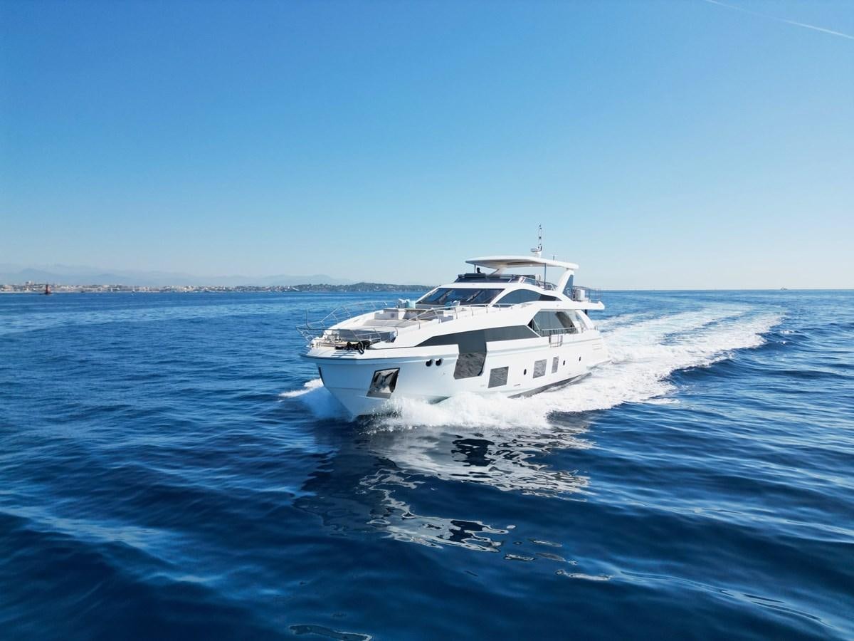 a white boat on the water aboard GRANDE 27M Yacht for Sale