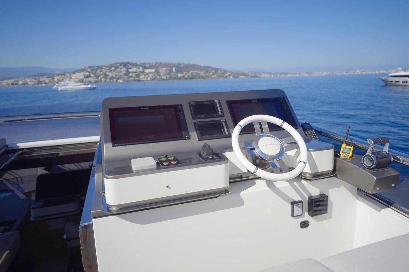 a boat with a steering wheel aboard GRANDE 27M Yacht for Sale