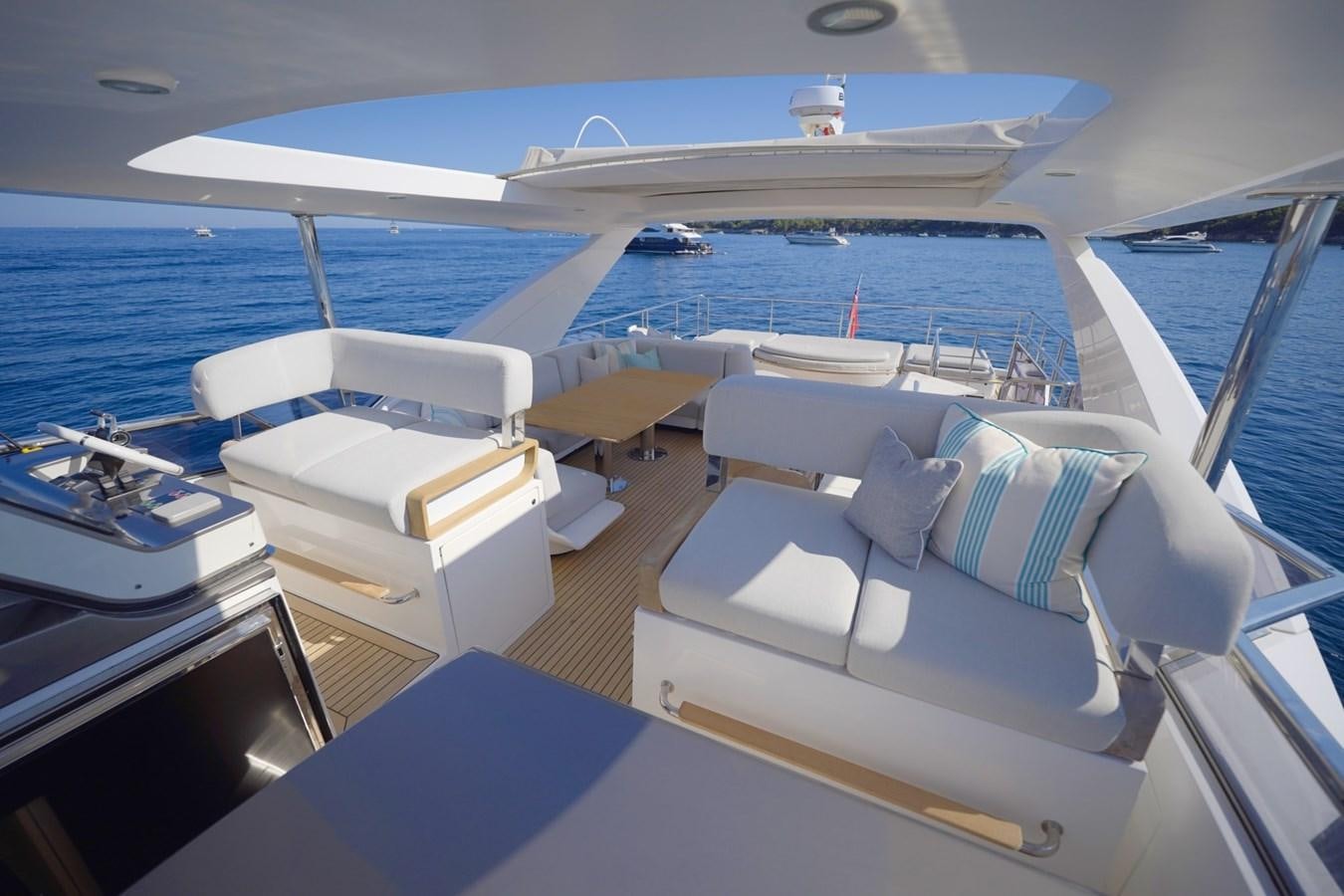 a boat with white seats aboard GRANDE 27M Yacht for Sale