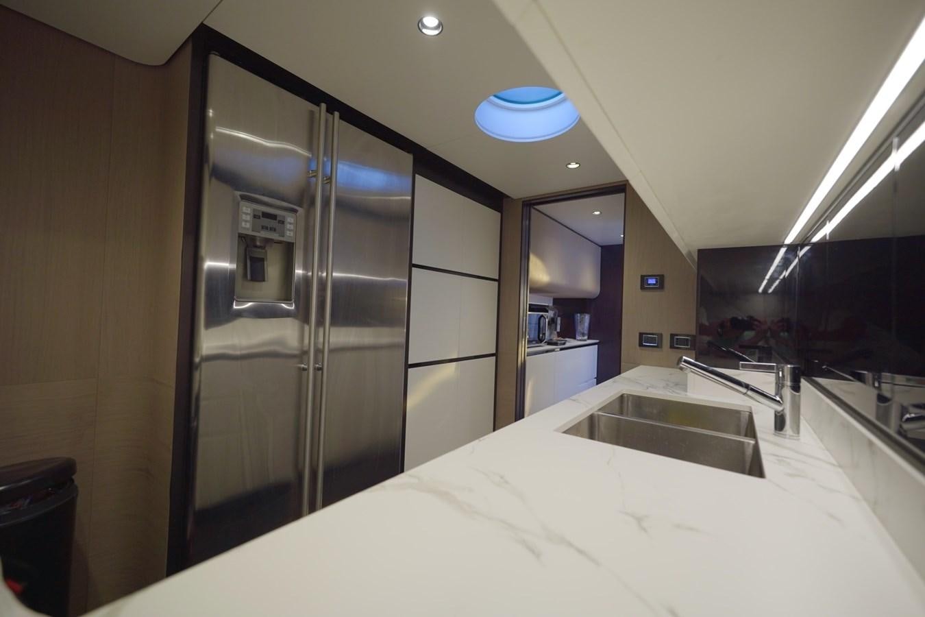 a large bathroom with a large glass shower unit aboard GRANDE 27M Yacht for Sale