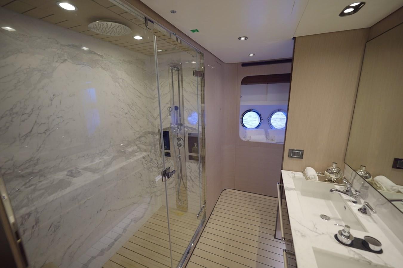 a bathroom with a shower and sink aboard GRANDE 27M Yacht for Sale