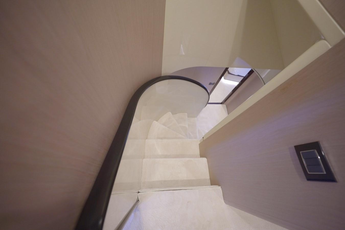 a white tile floor with a black and silver square object on it aboard GRANDE 27M Yacht for Sale