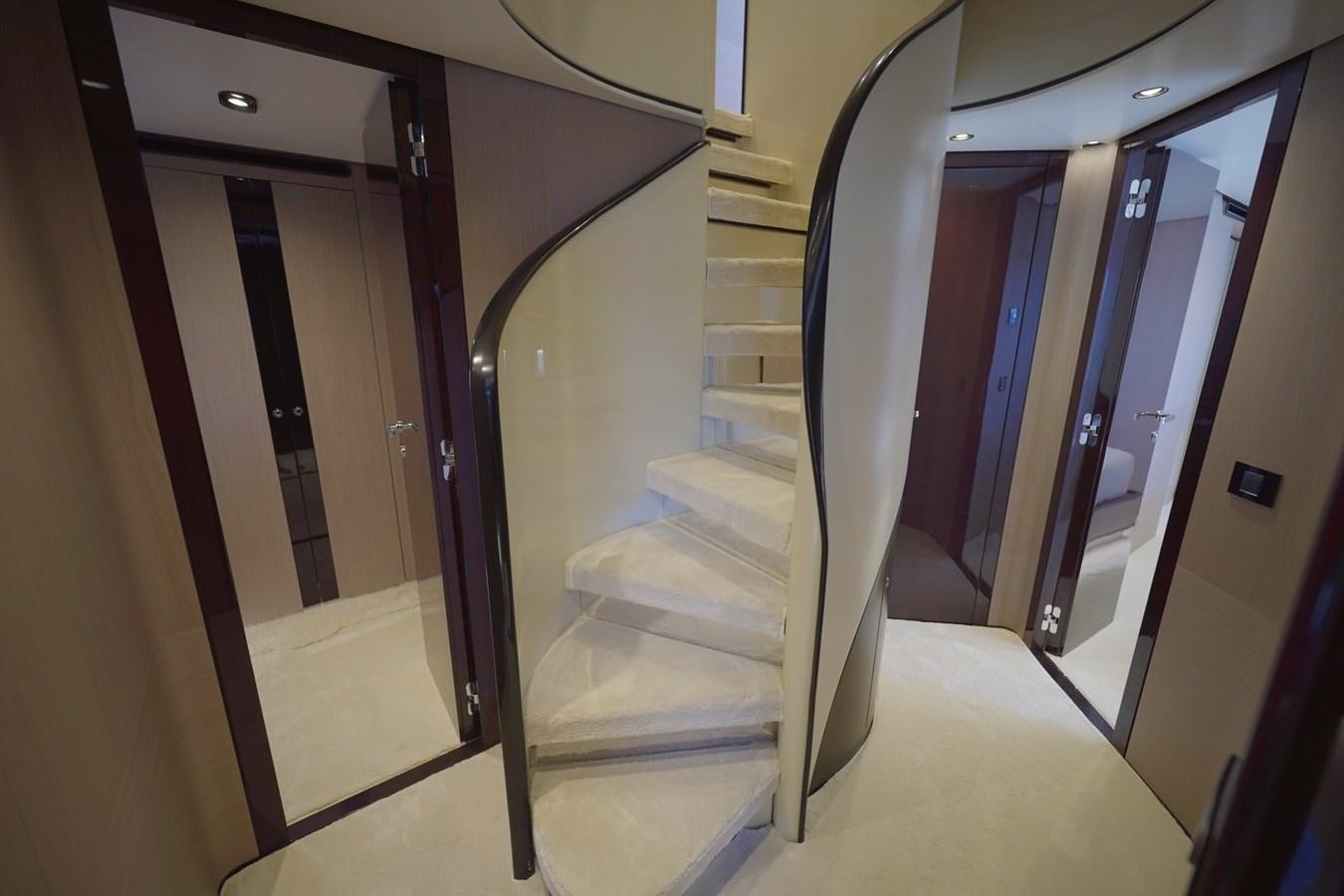 a hallway with doors aboard GRANDE 27M Yacht for Sale