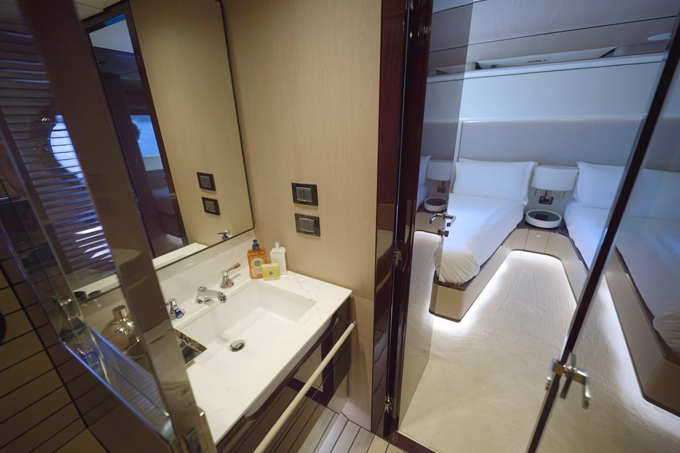 a bathroom with a sink and a bathtub aboard GRANDE 27M Yacht for Sale