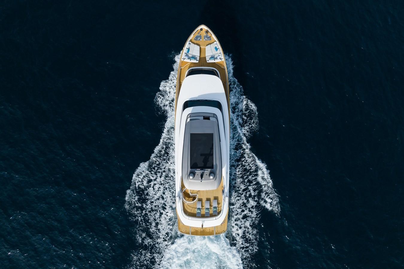 a white and yellow boat in the water aboard SWG Yacht for Sale