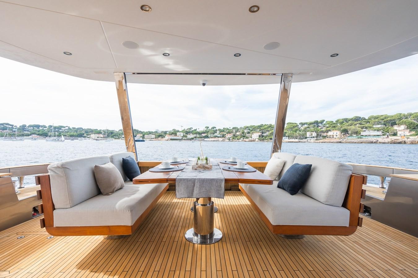 a room with a table and chairs aboard SWG Yacht for Sale