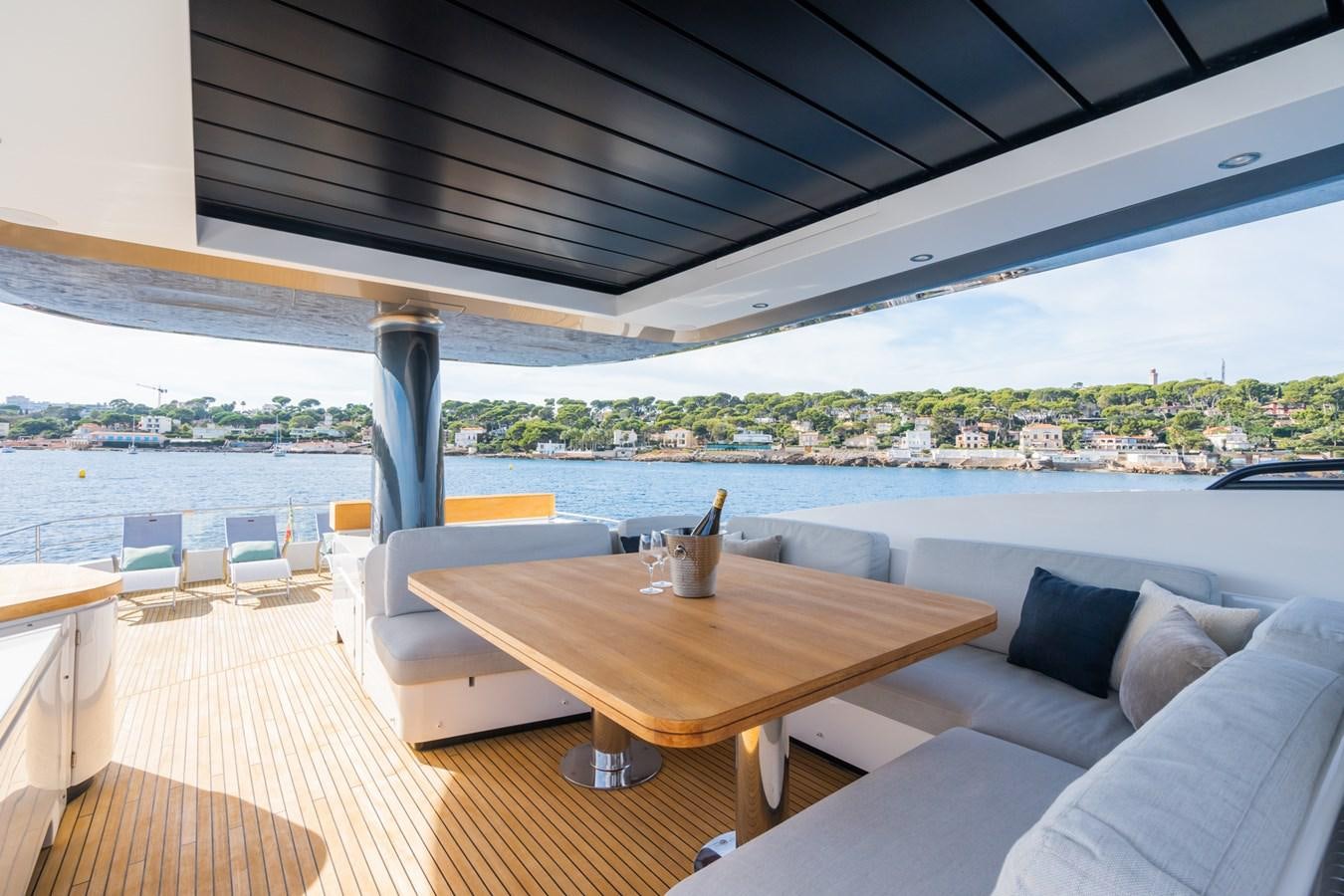 a room with a table and chairs aboard SWG Yacht for Sale