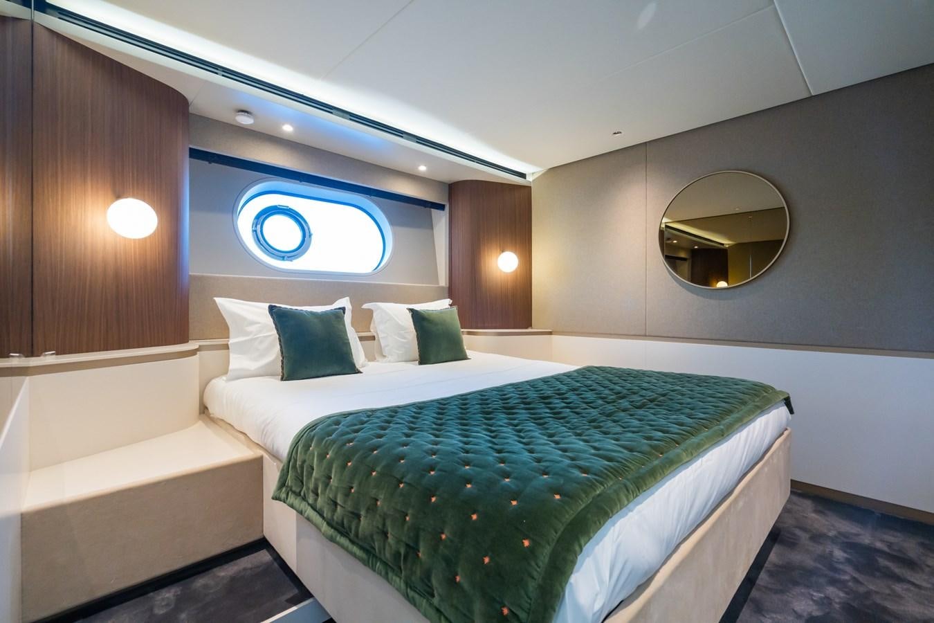 a room with two beds aboard SWG Yacht for Sale