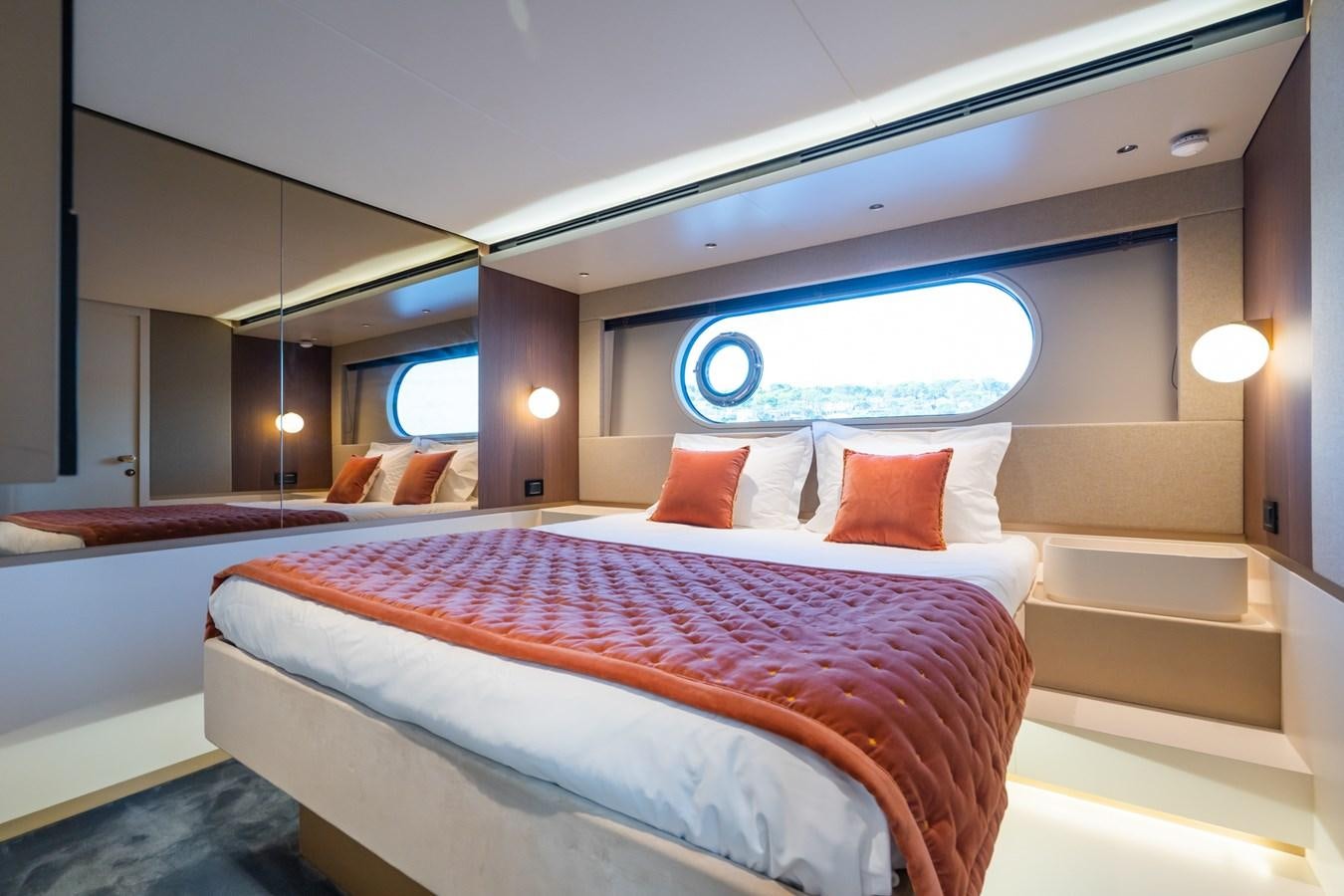 a bed with a large bed aboard SWG Yacht for Sale