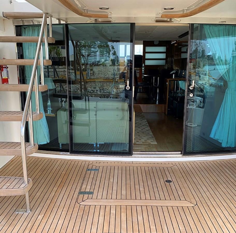 a glass door with glass walls aboard OCEANA Yacht for Sale