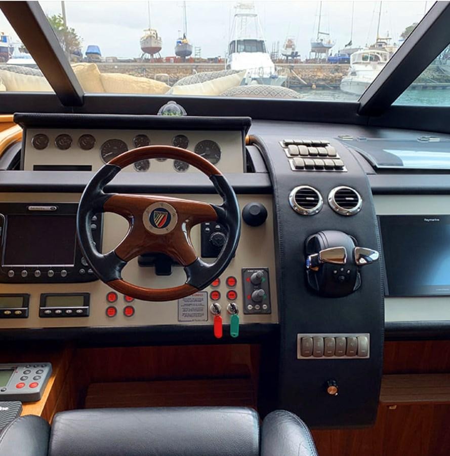inside of a car aboard OCEANA Yacht for Sale