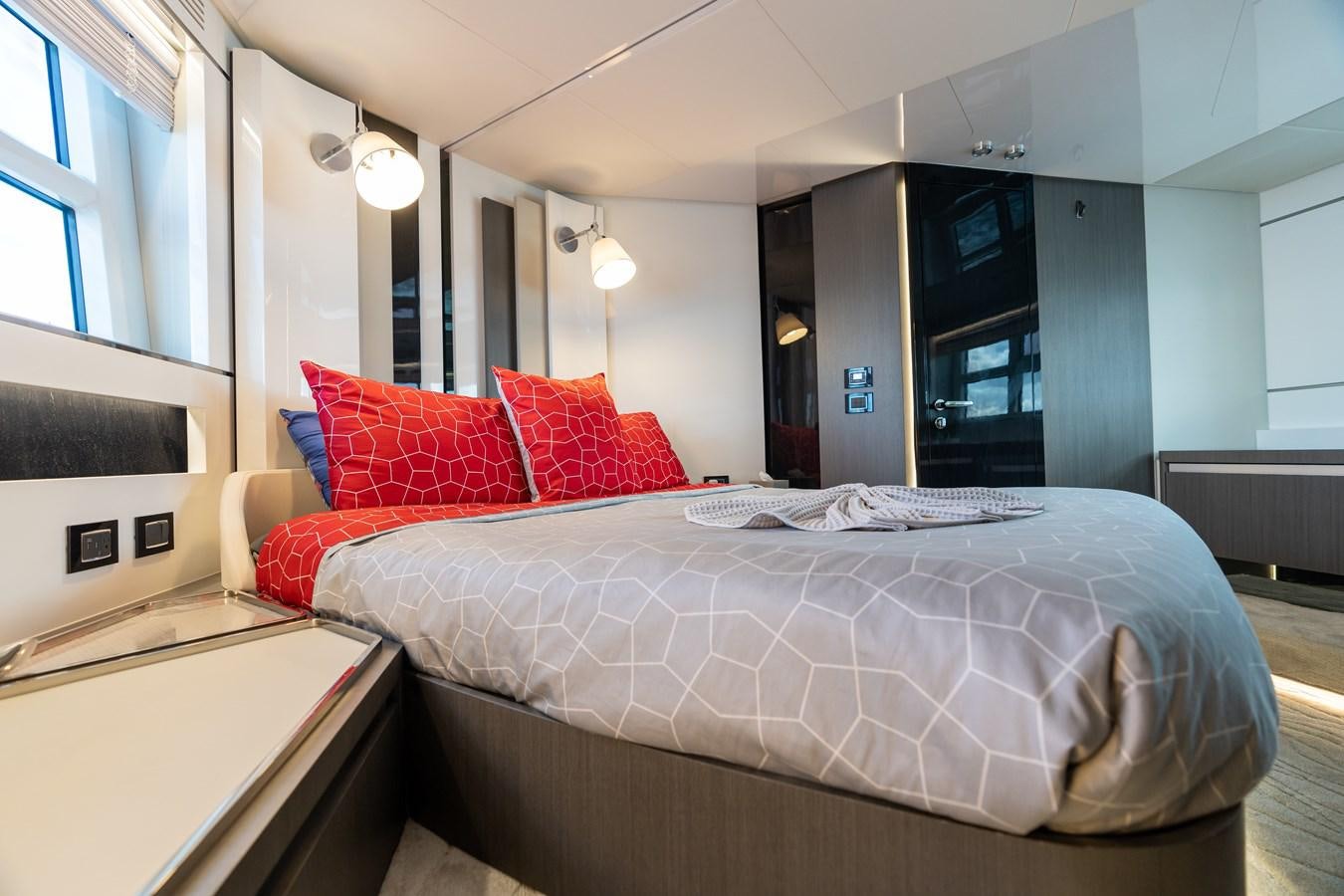 a bed in a room aboard ZERO DIMENSION Yacht for Sale