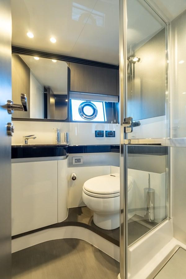 a bathroom with a glass shower aboard ZERO DIMENSION Yacht for Sale