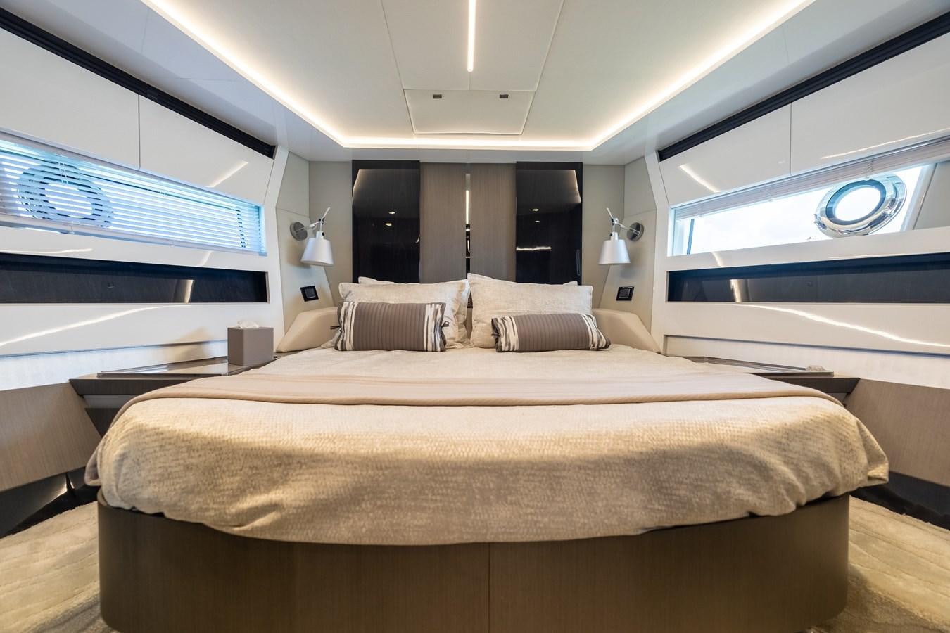a bed in a room aboard ZERO DIMENSION Yacht for Sale