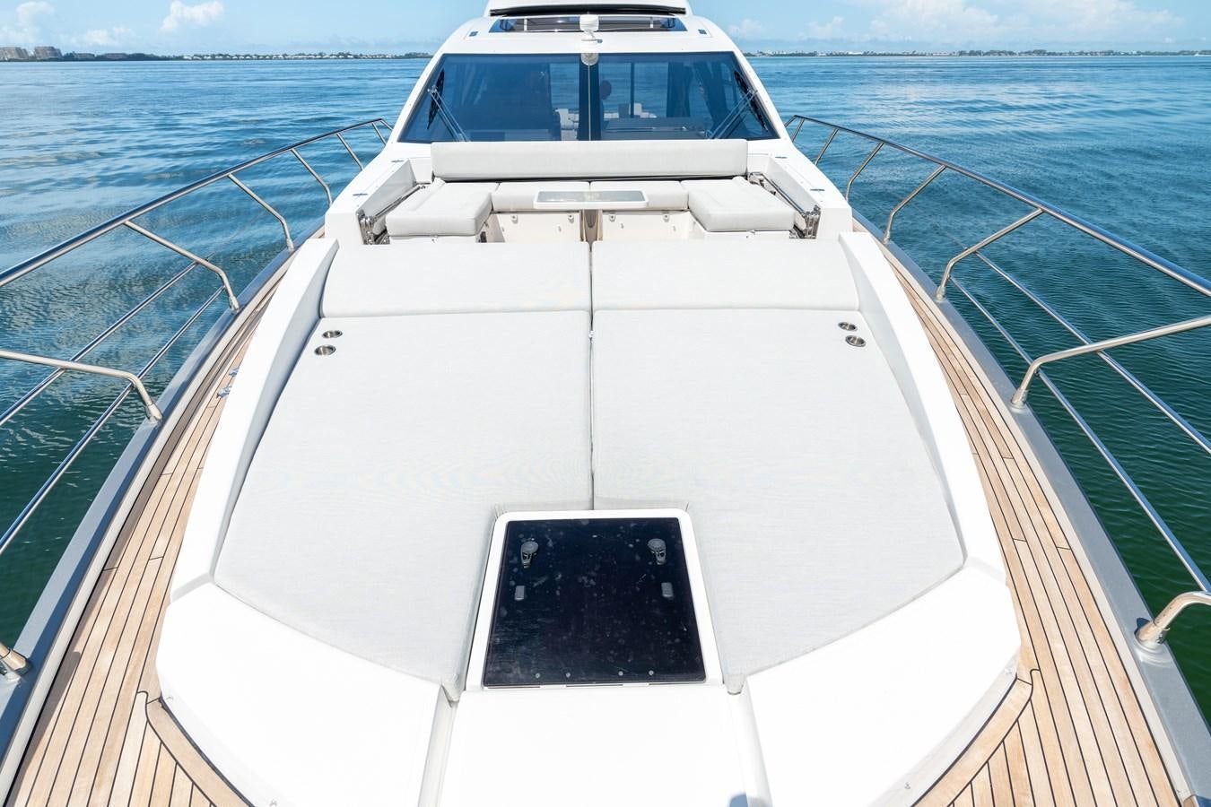a white boat on the water aboard ZERO DIMENSION Yacht for Sale