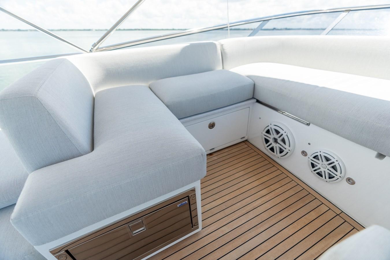 a white car with a wooden floor aboard ZERO DIMENSION Yacht for Sale