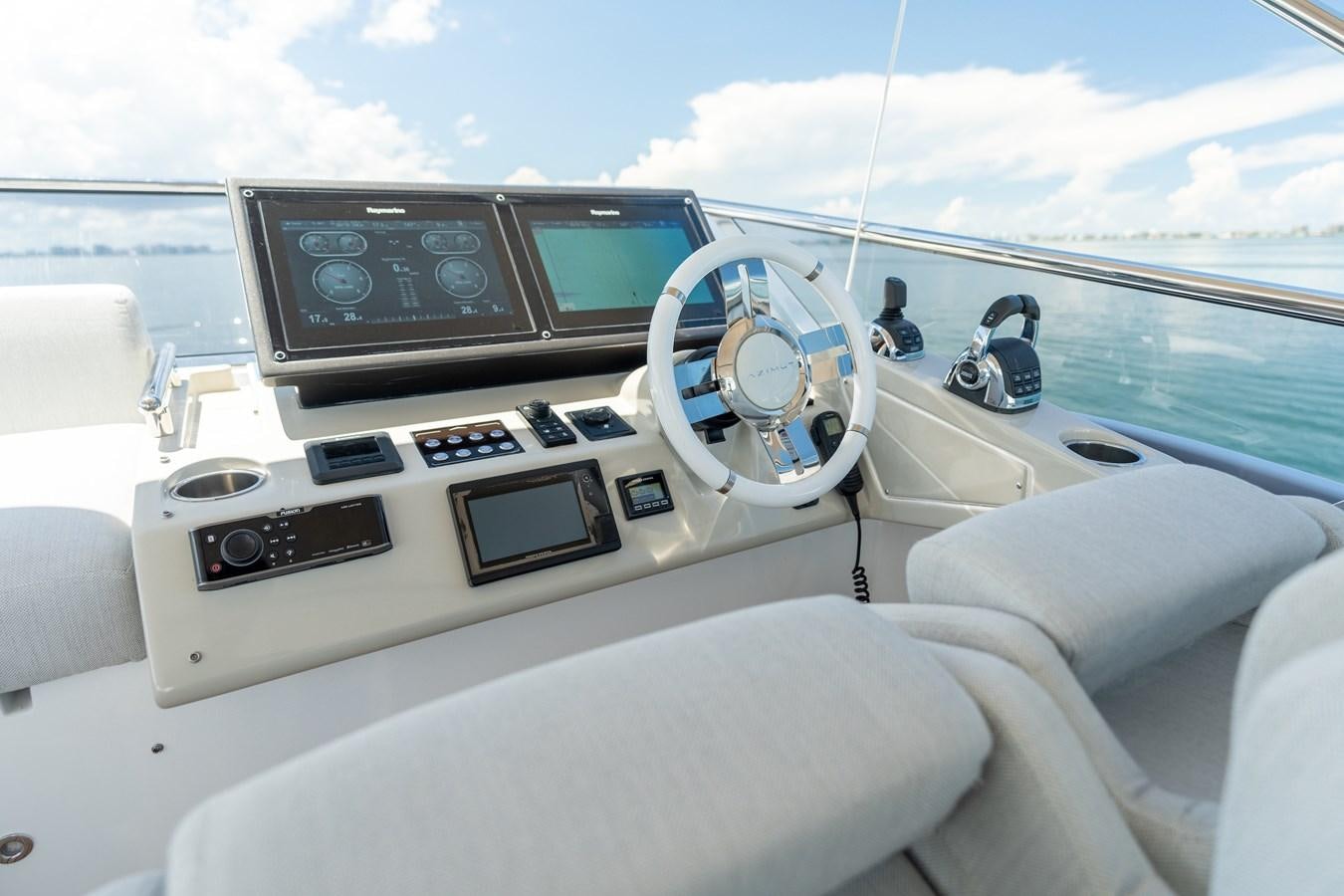 the inside of a car aboard ZERO DIMENSION Yacht for Sale