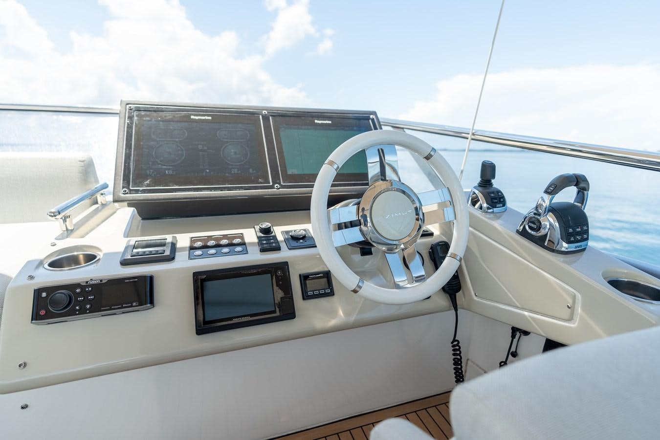 the inside of a white car aboard ZERO DIMENSION Yacht for Sale