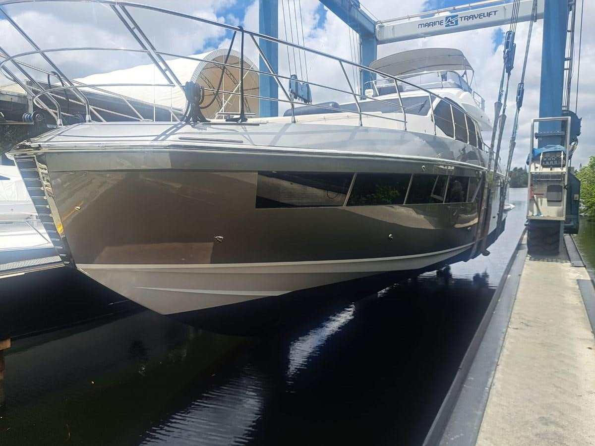 a reflection of a train in a glass case aboard ZERO DIMENSION Yacht for Sale