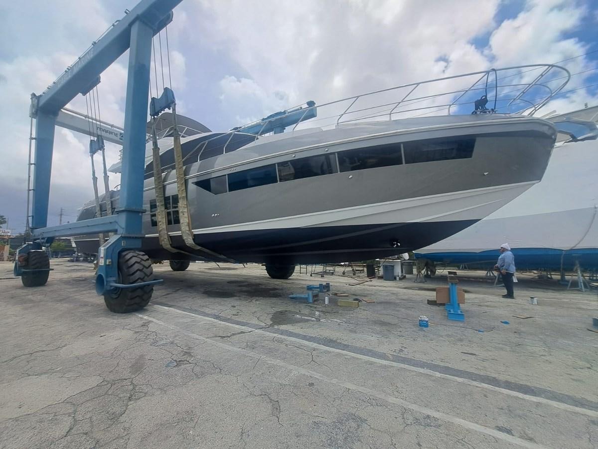 a plane parked on the ground aboard ZERO DIMENSION Yacht for Sale