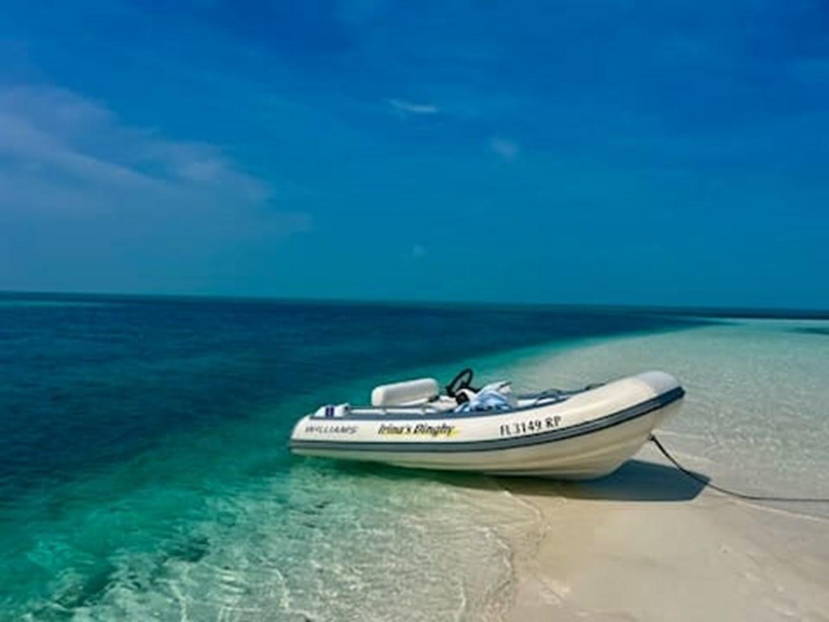 a boat on the water aboard ZERO DIMENSION Yacht for Sale