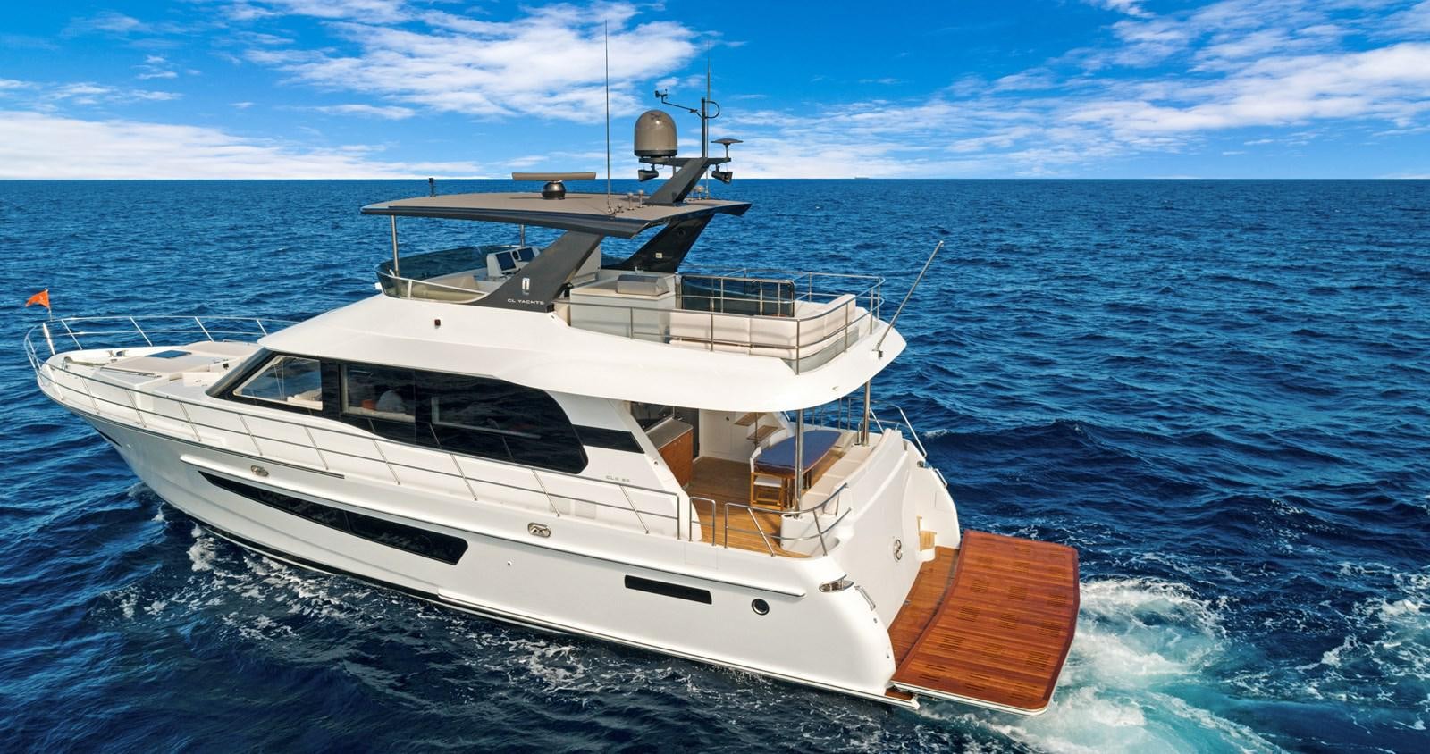 a white yacht on the water aboard CLB65 Yacht for Sale