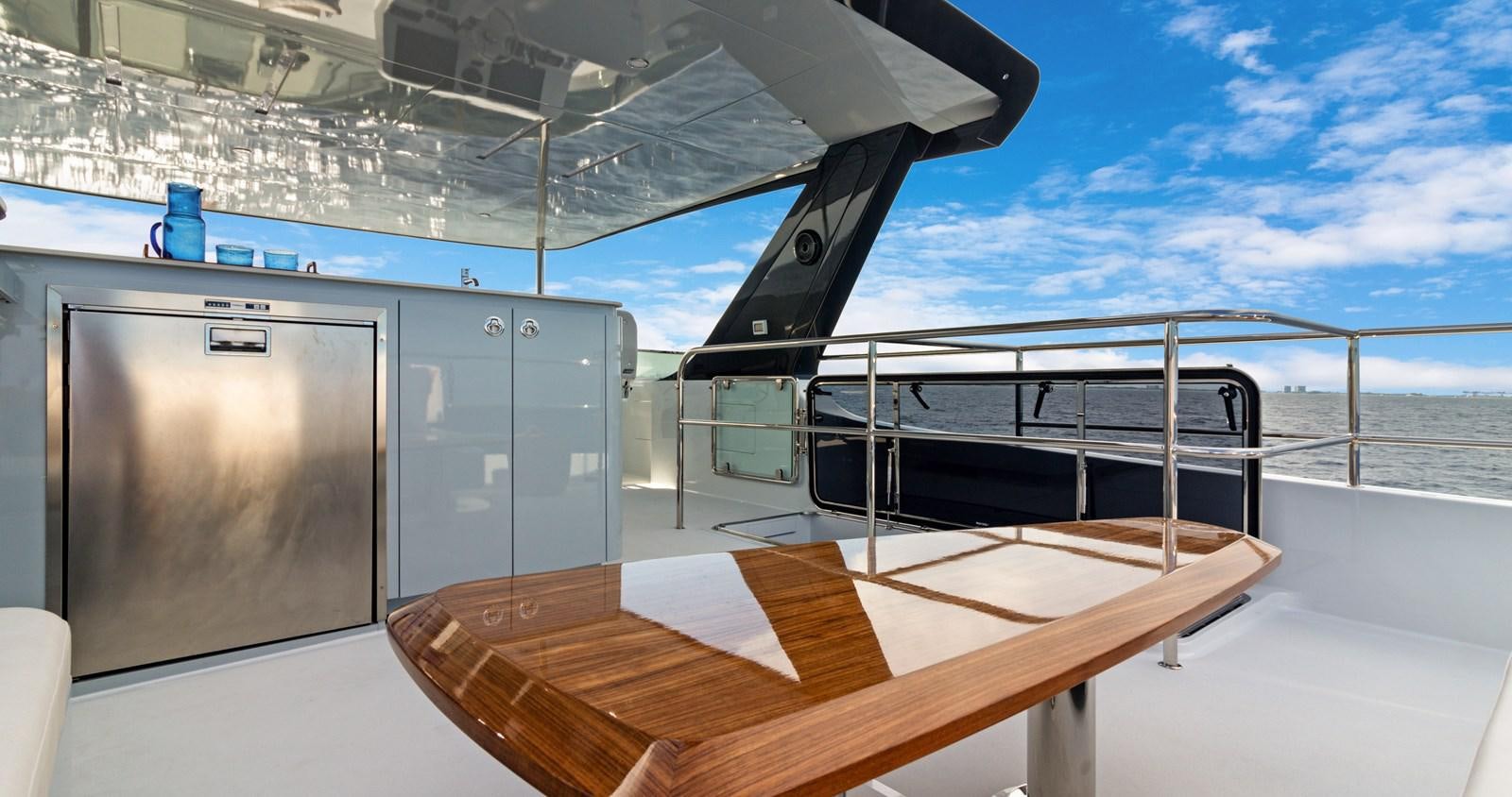 a boat on a deck aboard CLB65 Yacht for Sale