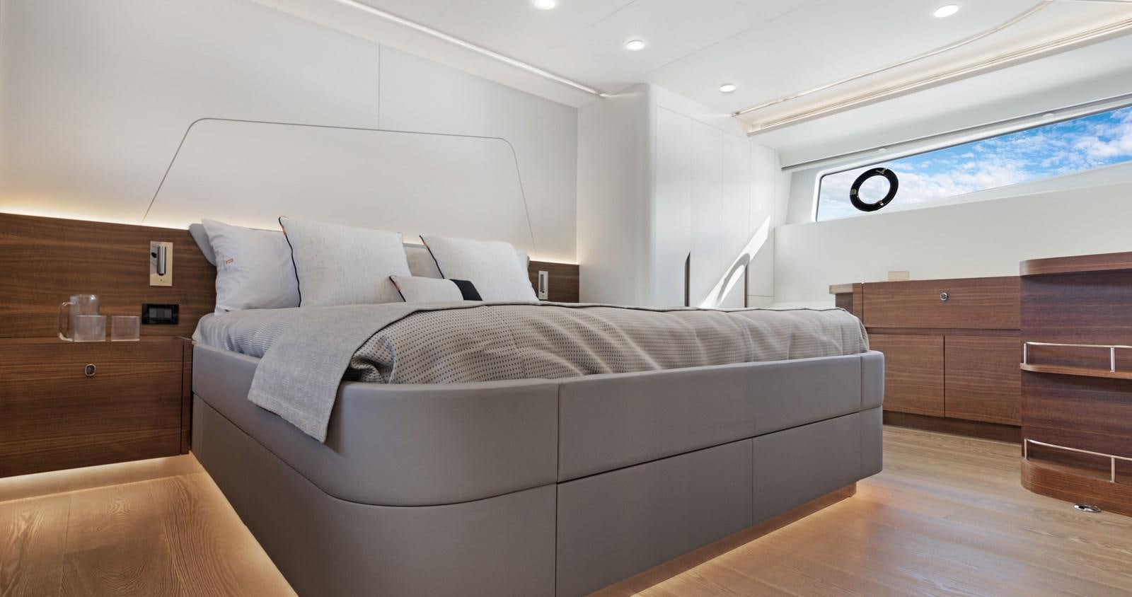 a bed in a room aboard CLB65 Yacht for Sale