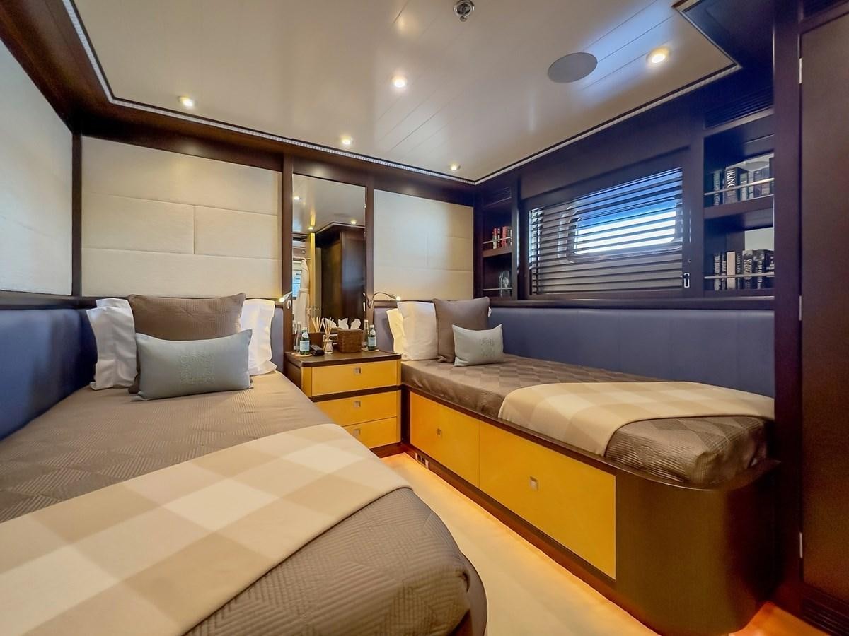 a room with two beds aboard AD LIB Yacht for Sale