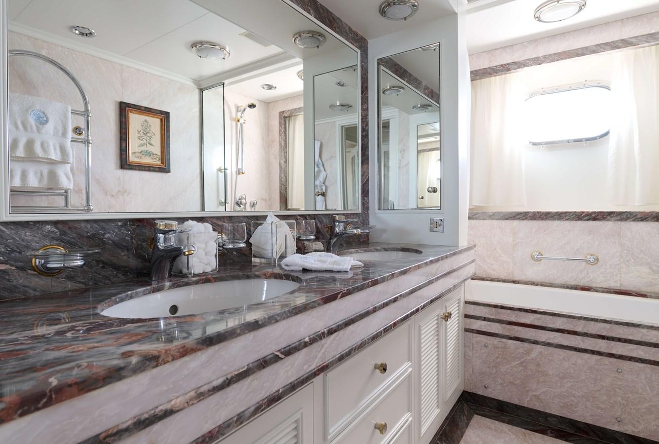 a bathroom with a large countertop aboard LADY BEATRICE Yacht for Sale