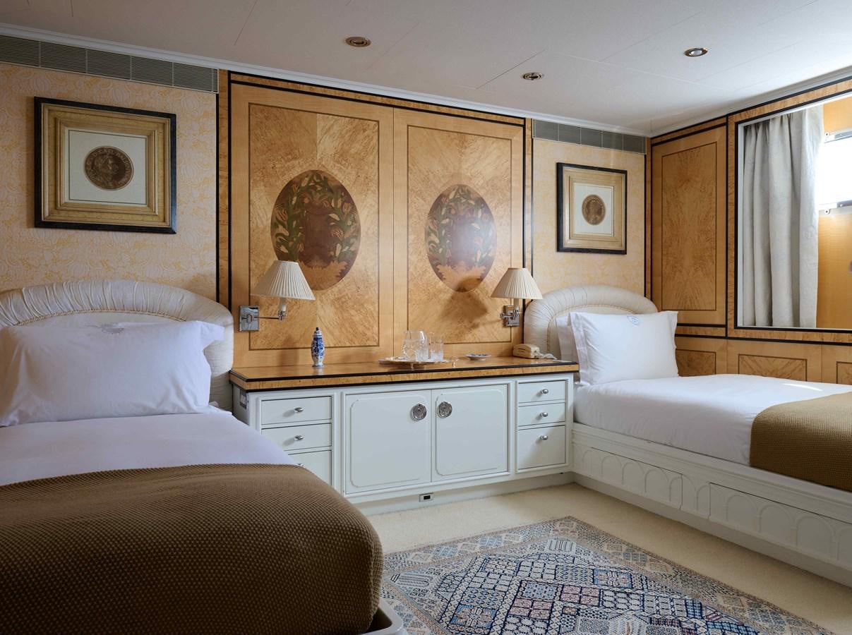 a room with two beds aboard LADY BEATRICE Yacht for Sale