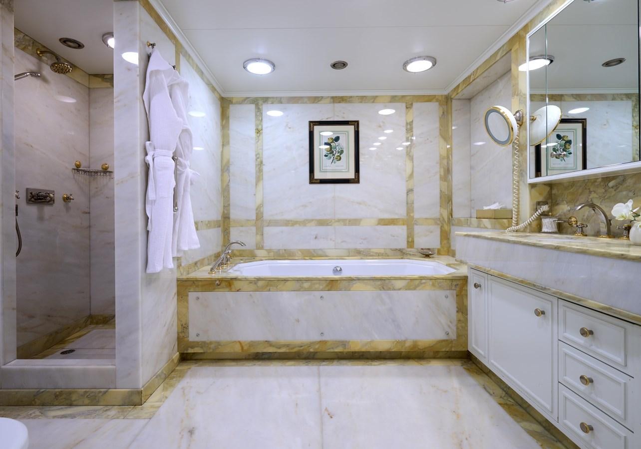 a bathroom with a large bathtub aboard LADY BEATRICE Yacht for Sale