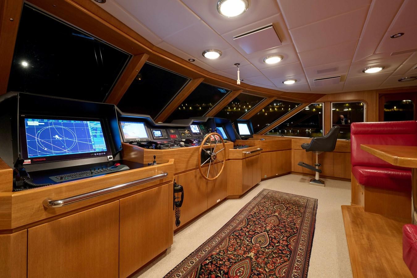 a room with a tv and a couch aboard LADY BEATRICE Yacht for Sale