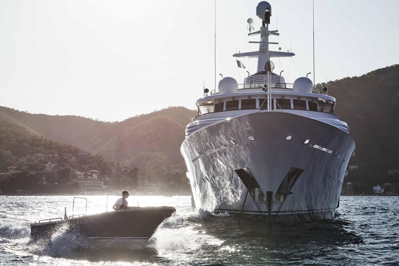 a large boat on the water aboard LADY BEATRICE Yacht for Sale