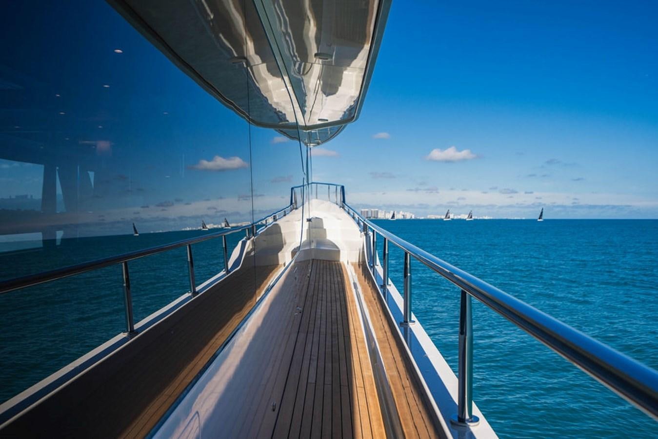 a long wooden dock over water aboard FAR NIENTE Yacht for Sale