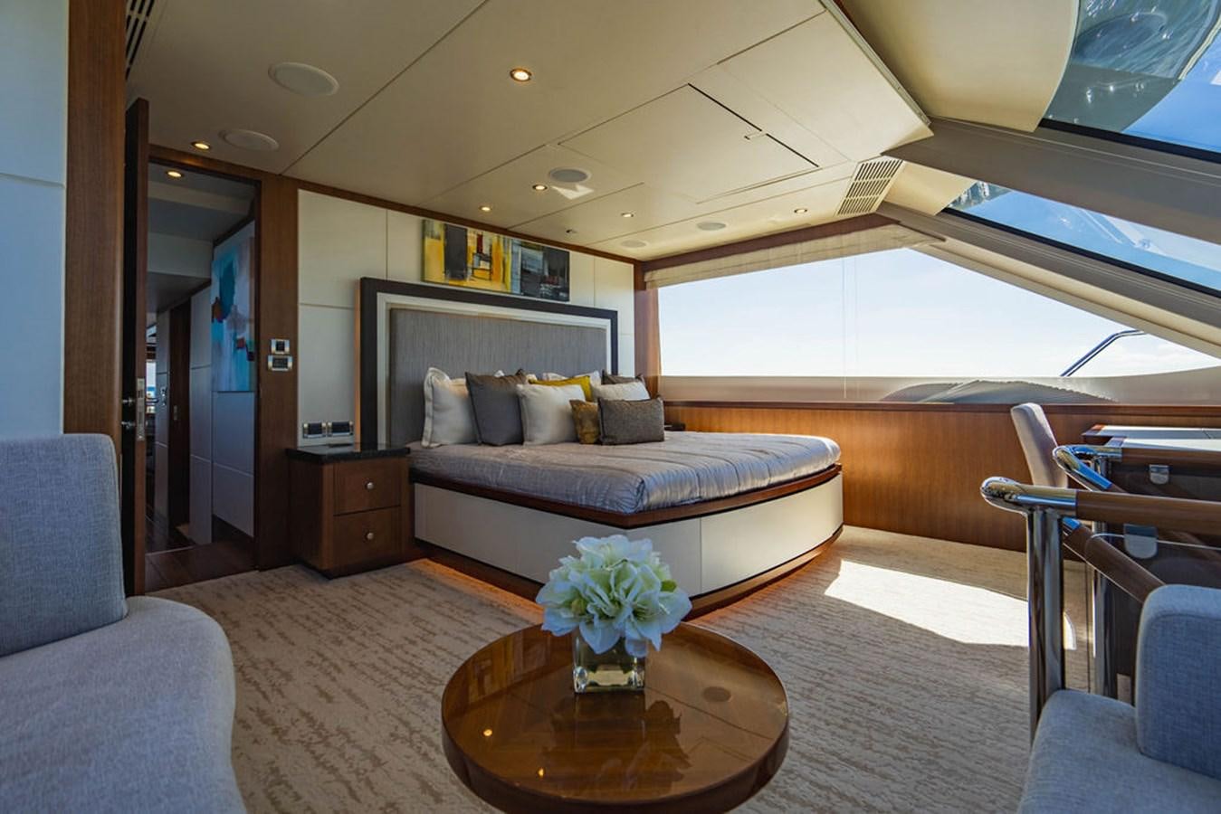 a living room with a couch and a table aboard FAR NIENTE Yacht for Sale