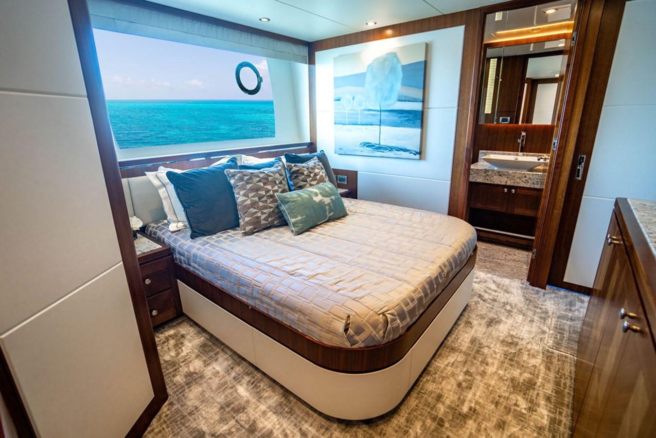 a bed in a room aboard FAR NIENTE Yacht for Sale