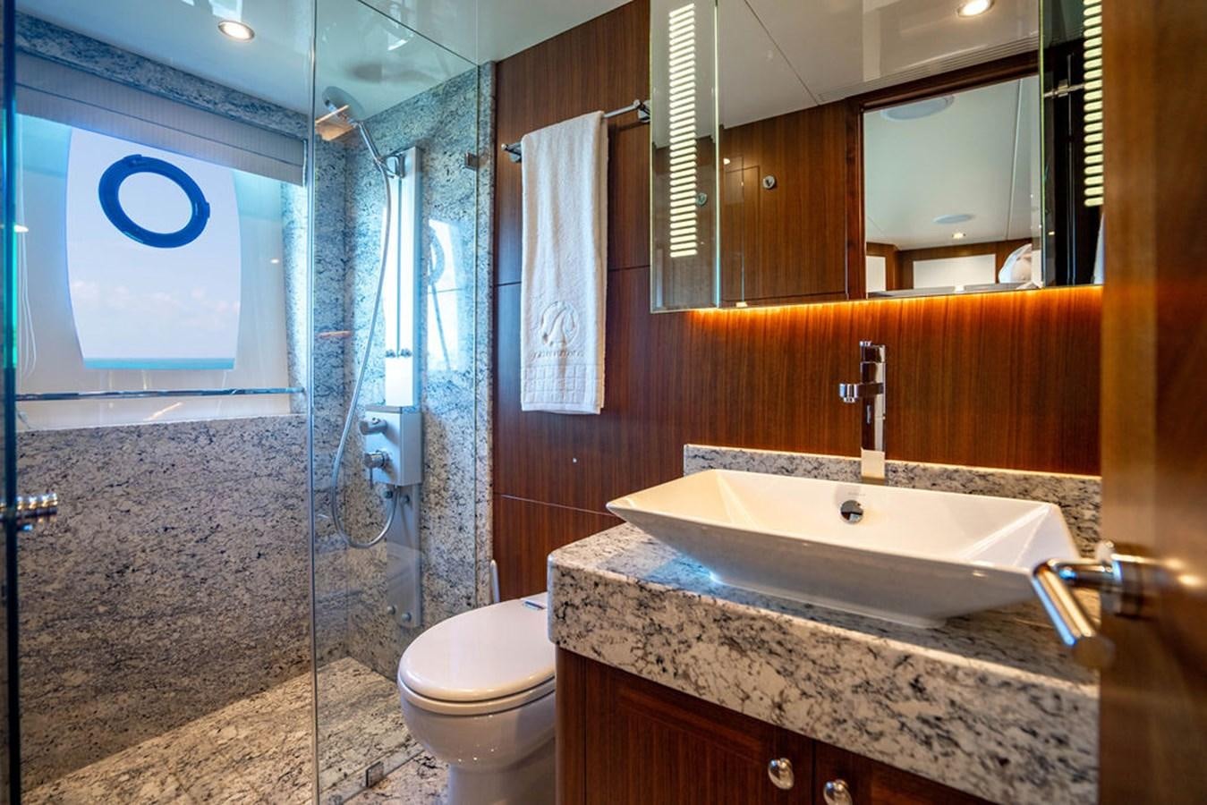 a bathroom with a sink and a toilet aboard FAR NIENTE Yacht for Sale