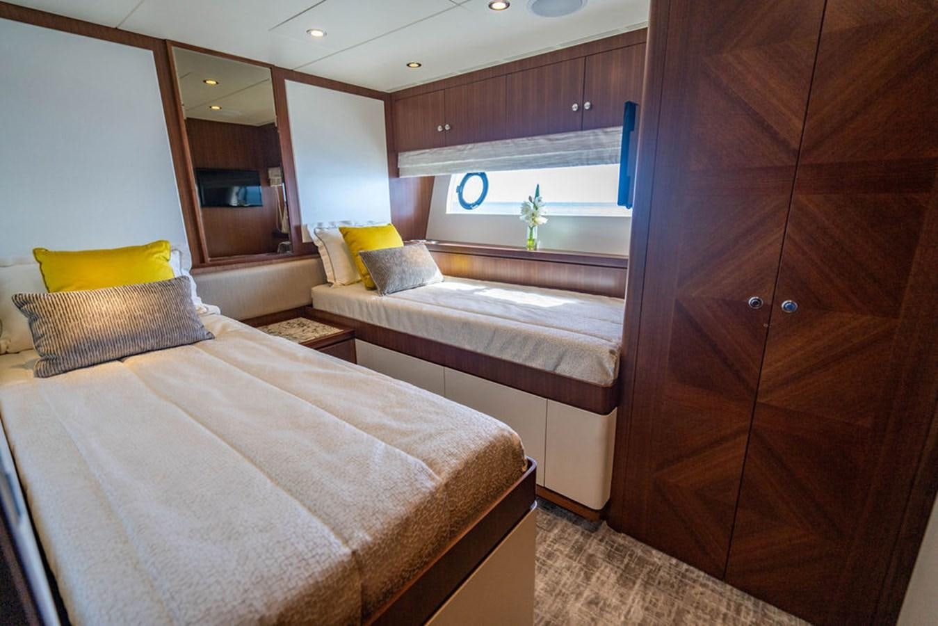a bedroom with a bed and a sink aboard FAR NIENTE Yacht for Sale