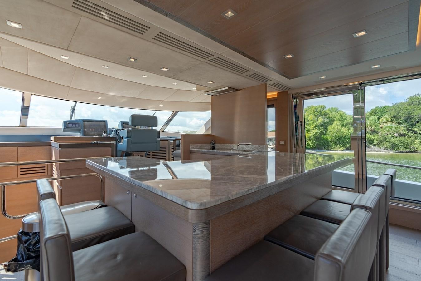 a large conference room with a table and chairs aboard PANDA Yacht for Sale