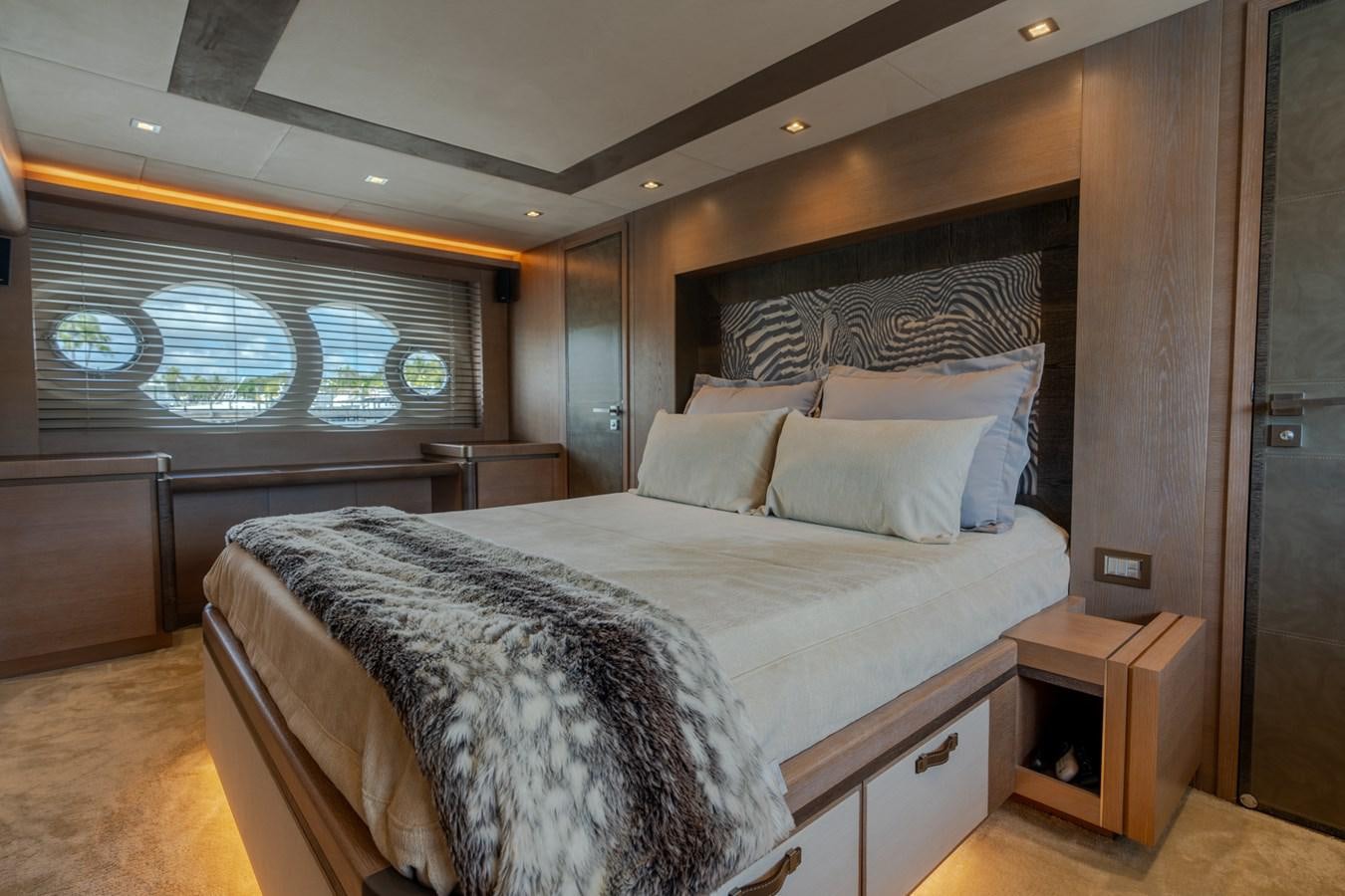 a bed in a room aboard PANDA Yacht for Sale