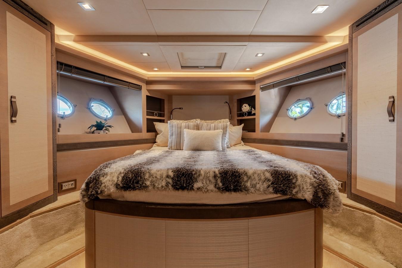 a bed in a room aboard PANDA Yacht for Sale