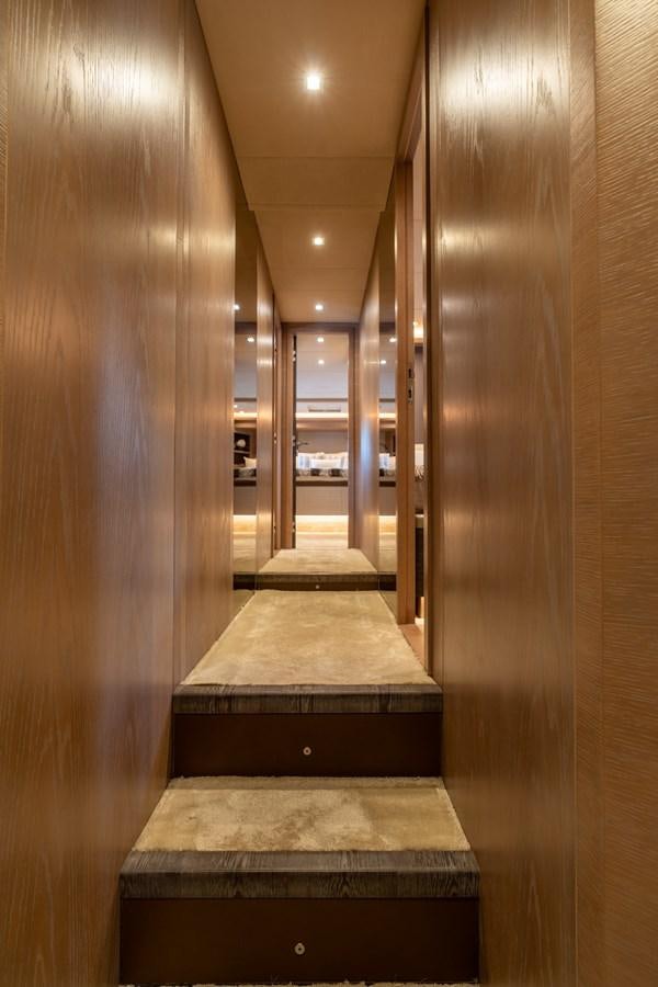 a long hallway with a carpet aboard PANDA Yacht for Sale