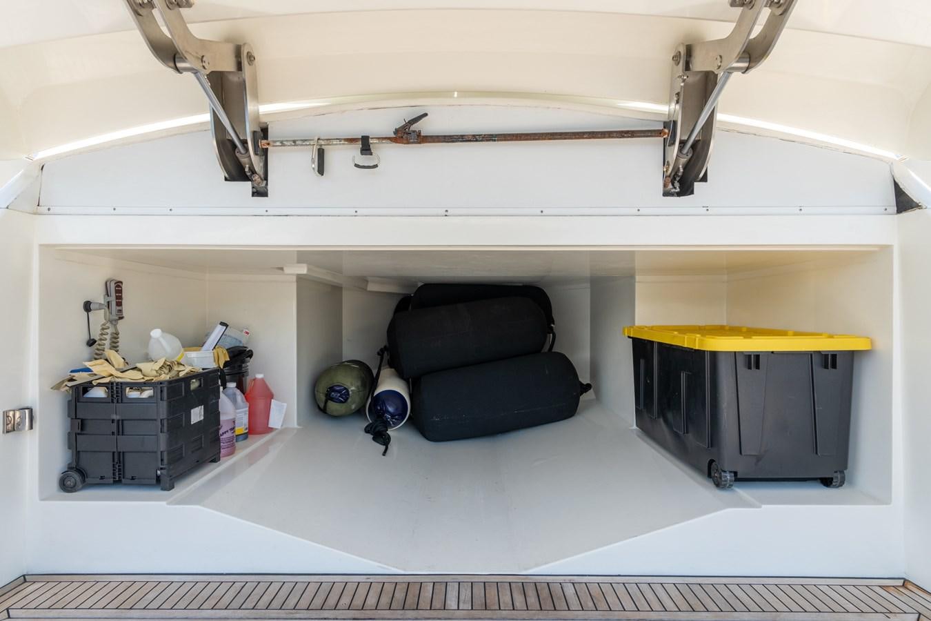 a room with a couch and a machine aboard PANDA Yacht for Sale