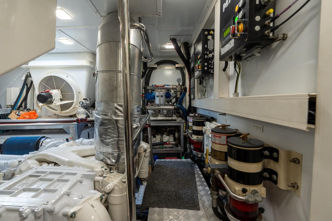 a room with machinery aboard PANDA Yacht for Sale